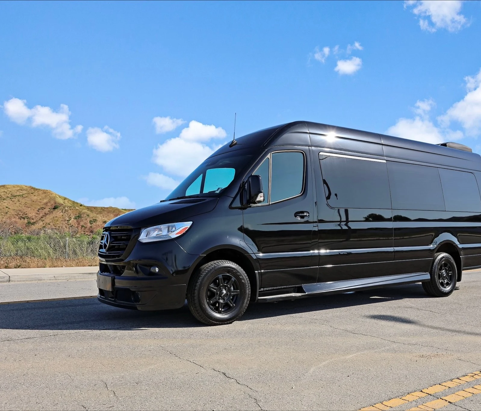 Black luxury passenger vehicle exterior